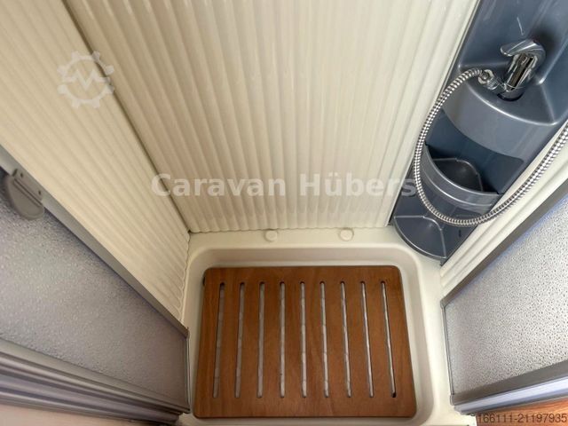 Half-integraal camper CARADO T 348 - Hub/Festbett - Klima - Garage -