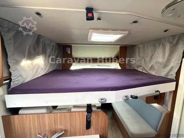 Half-integraal camper CARADO T 348 - Hub/Festbett - Klima - Garage -