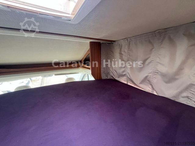 Half-integraal camper CARADO T 348 - Hub/Festbett - Klima - Garage -