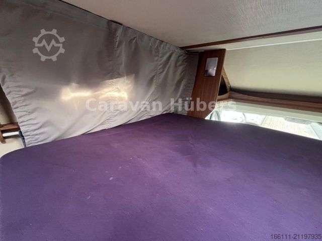 Half-integraal camper CARADO T 348 - Hub/Festbett - Klima - Garage -