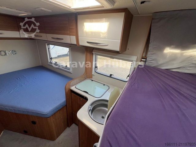 Half-integraal camper CARADO T 348 - Hub/Festbett - Klima - Garage -