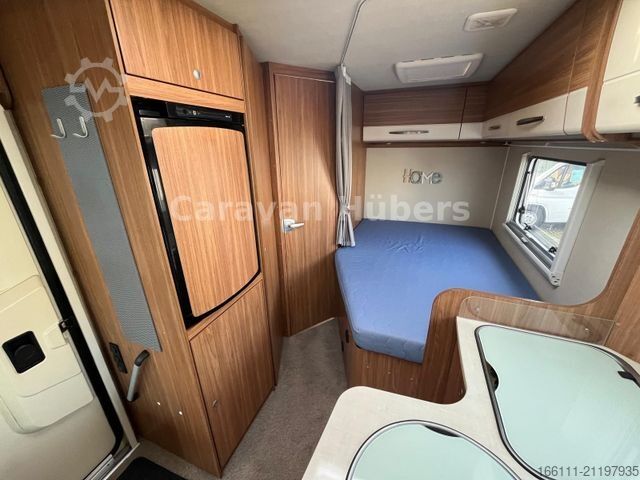 Half-integraal camper CARADO T 348 - Hub/Festbett - Klima - Garage -