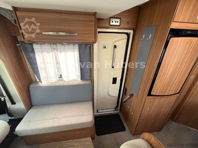 Half-integraal camper CARADO T 348 - Hub/Festbett - Klima - Garage -