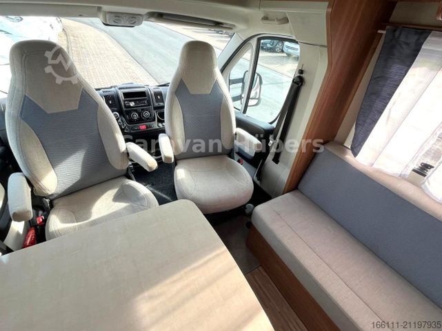 Half-integraal camper CARADO T 348 - Hub/Festbett - Klima - Garage -