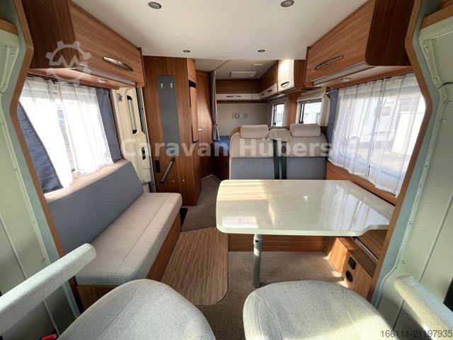 Half-integraal camper CARADO T 348 - Hub/Festbett - Klima - Garage -