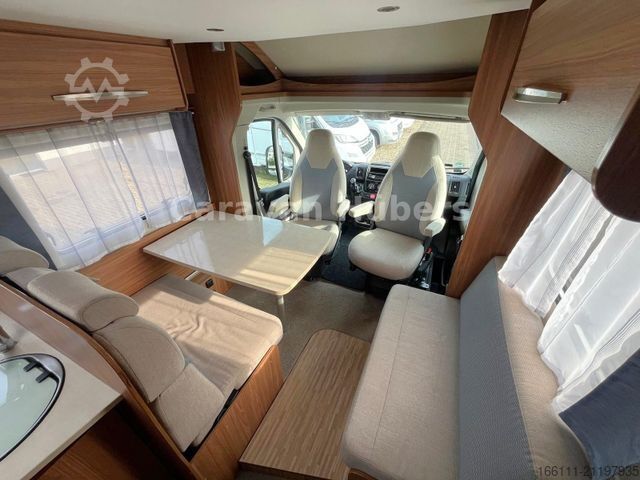 Half-integraal camper CARADO T 348 - Hub/Festbett - Klima - Garage -