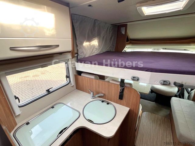 Half-integraal camper CARADO T 348 - Hub/Festbett - Klima - Garage -