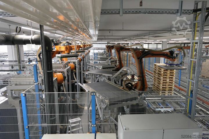 Linia paletyzująca z robotami KUKA KUKA Automatische Palettieranlage
