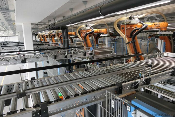 Linia paletyzująca z robotami KUKA KUKA Automatische Palettieranlage