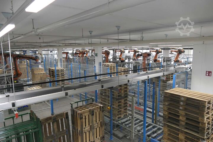 Linia paletyzująca z robotami KUKA KUKA Automatische Palettieranlage
