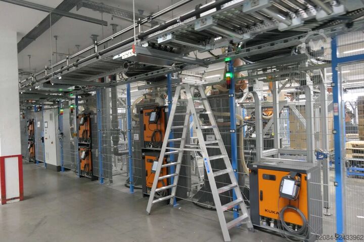 Linia paletyzująca z robotami KUKA KUKA Automatische Palettieranlage