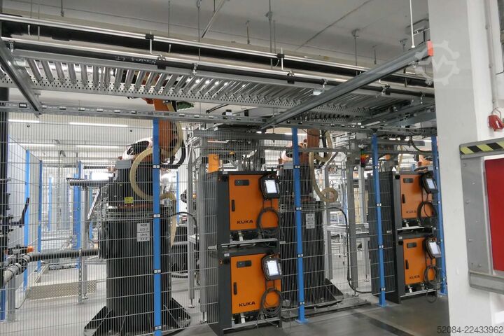 Linia paletyzująca z robotami KUKA KUKA Automatische Palettieranlage