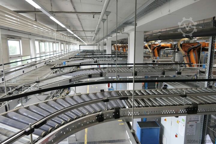 Linia paletyzująca z robotami KUKA KUKA Automatische Palettieranlage