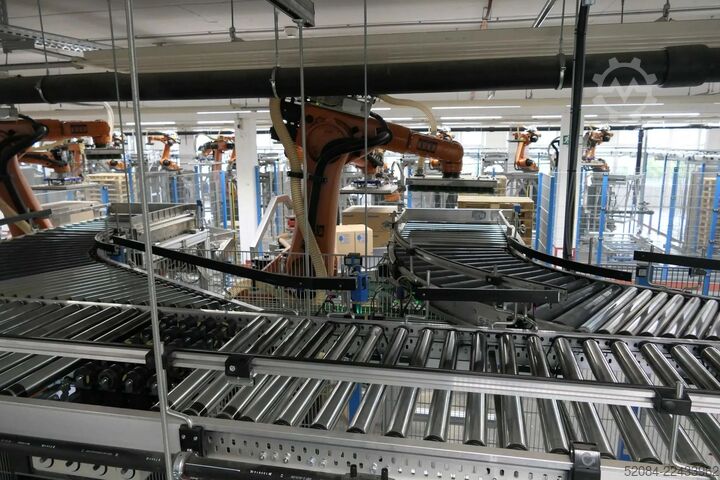 Linia paletyzująca z robotami KUKA KUKA Automatische Palettieranlage