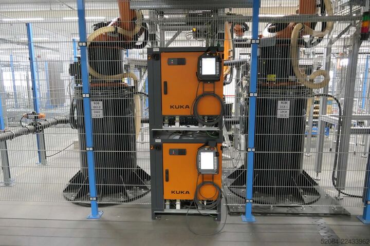 Linia paletyzująca z robotami KUKA KUKA Automatische Palettieranlage