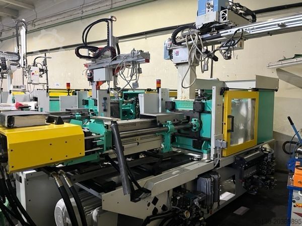 Machine de moulage par injection Arburg 420C 1300-675 mit dem Angußpicker Star
