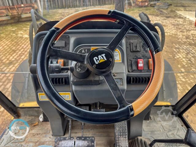 Kombination af gravemaskine og læsser Caterpillar 428C