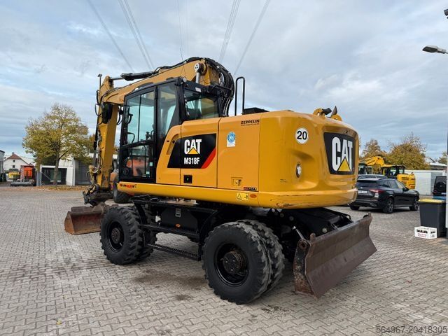 Pelle sur pneus CATERPILLAR M 318 F OQ65 SW Zentralschmierung