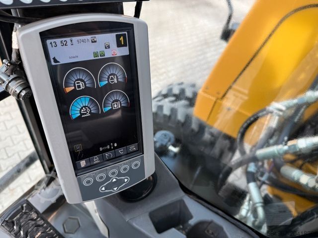 Pelle sur pneus CATERPILLAR M 318 F OQ65 SW Zentralschmierung