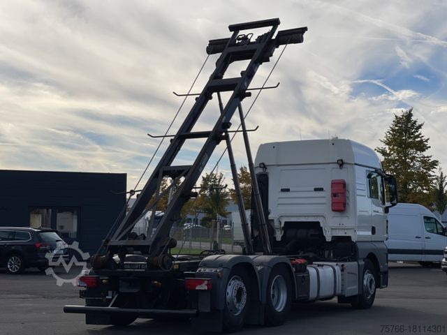 Kanca kasalı yük kamyonu (roll-off) MAN TGX 26.400 XLX / INTARDER / HIAB-SEILABROLLER