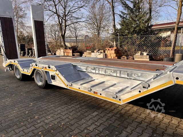 Remorcă cu platformă joasă Möslein T 4 VB H1 R  neuer 4 Achs Tieflader + Radmulden