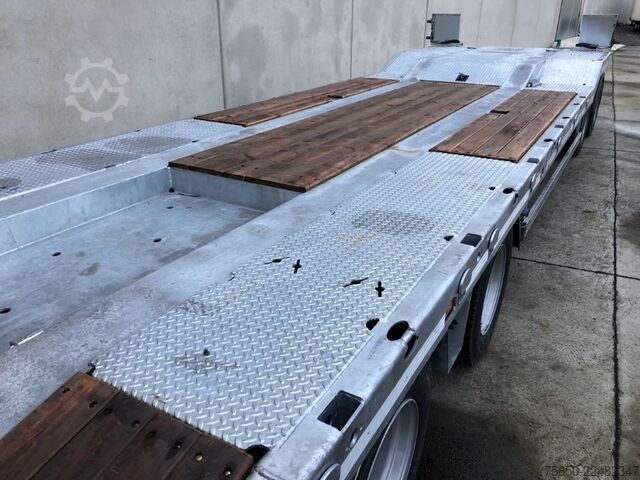 Remorcă cu platformă joasă Möslein T 4 VB H1  neuer 4 Achs Tieflader hydraulischen Rampen
