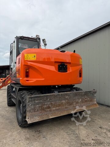 Escavatore gommato Hitachi ZX 145 W-3