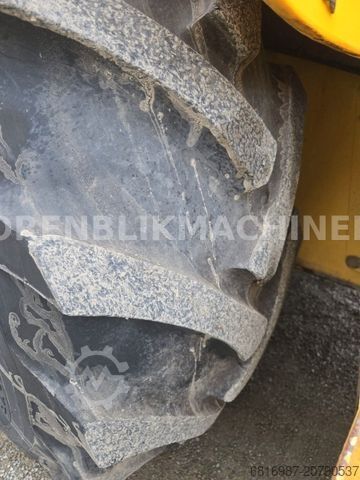 Backhoe loader NEW HOLLAND LB95-4PT