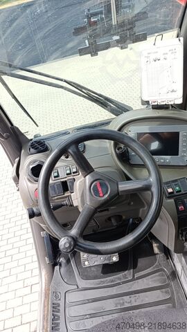 încărcător telescopic rotativ Manitou MRT 25.40+
