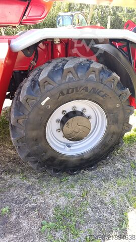 încărcător telescopic rotativ Manitou MRT 25.40+