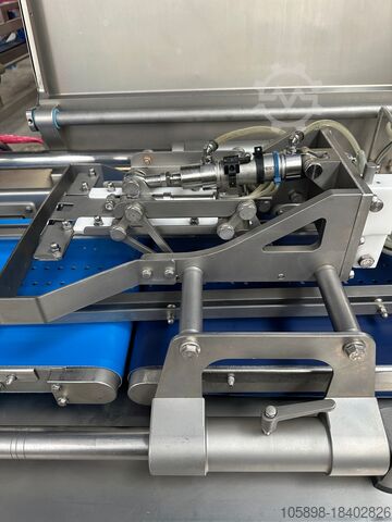 Automatická linka na plnění klobás s automatickým plněním tácu. Handtmann VF628, PVLS143, GM310 and ZB311