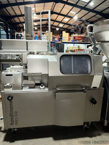 Automatická linka na plnění klobás s automatickým plněním tácu. Handtmann VF628, PVLS143, GM310 and ZB311