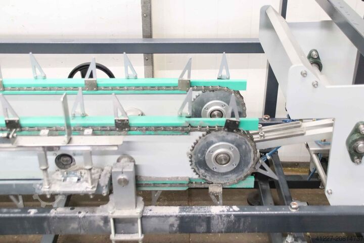 Przenośnik łańcuchowy do poziomej kartoniarki nomatech BOX 60H