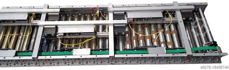 Sistema de transporte de elementos de acionamento, transportadores de rolos de acumulação... Dematic 3000-600-540