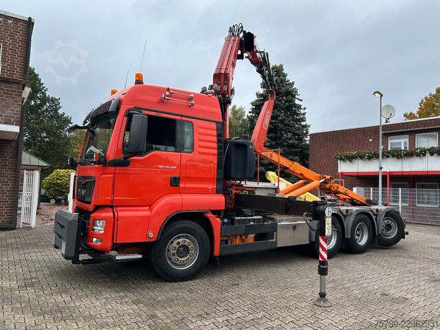 Truck mounted crane MAN 35.500 TGS Abroller mit Fassi F315RA.2.26 Kran