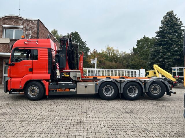 Truck mounted crane MAN 35.500 TGS Abroller mit Fassi F315RA.2.26 Kran
