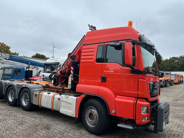 Truck mounted crane MAN 35.500 TGS Abroller mit Fassi F315RA.2.26 Kran