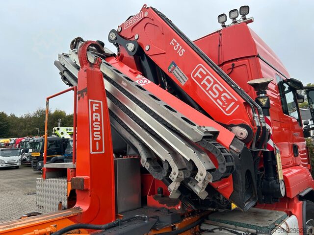 Truck mounted crane MAN 35.500 TGS Abroller mit Fassi F315RA.2.26 Kran