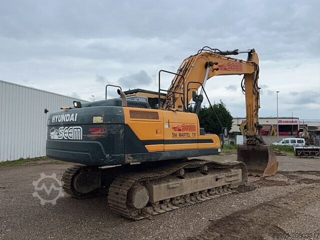 Tracked Excavator Hyundai HX300 NL with a bucket