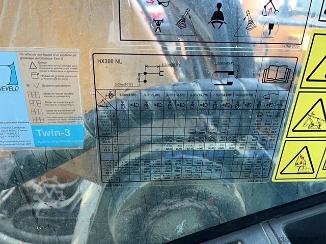 Tracked Excavator Hyundai HX300 NL with a bucket