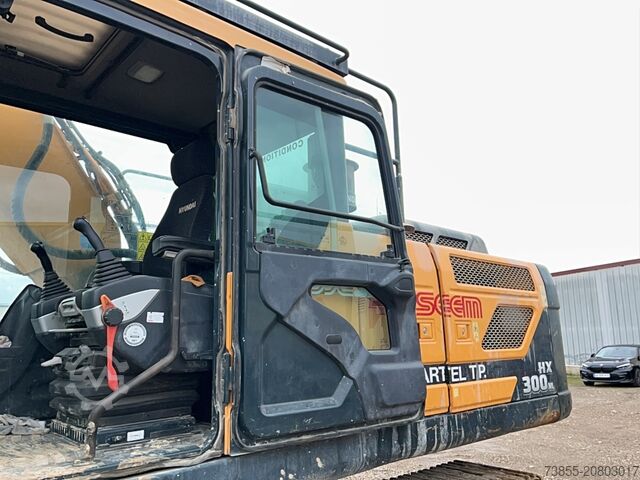 Tracked Excavator Hyundai HX300 NL with a bucket