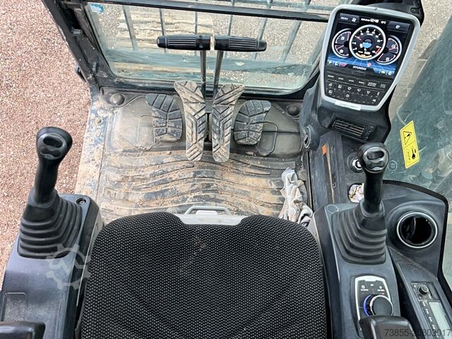 Tracked Excavator Hyundai HX300 NL with a bucket