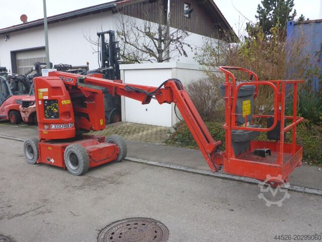 Scharnierend telescopisch platform JLG JLG E300 AJP