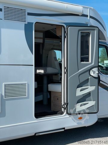 Teilintegriertes Wohnmobil GLUECKSMOBIL T 691 EB |Bestpreis| inkl. Hubbett