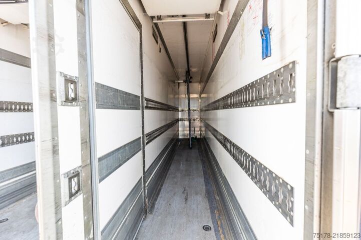 Refrigerated/freezer transport RENAULT MIDLUM 220 DXI +TK T1000 R MT+DHOLLANDIA