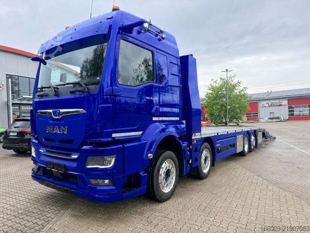 Camion plateau MAN Baumaschinen Maschinentransporter mit Rampen
