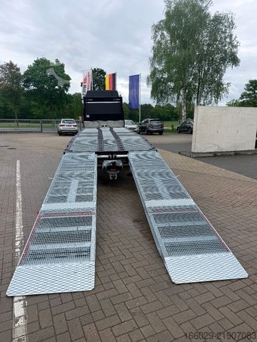 Camion plateau MAN Baumaschinen Maschinentransporter mit Rampen