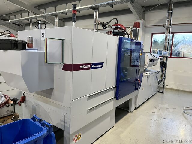 Plastic injection molding machine Wittmann Battenfeld EcoPower 180/750 Unilog B8