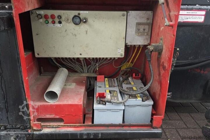 Scissor lift Holland Lift Combistar B-195DL25-4WD/P/N Diesel, 4x4 Drive, 21.