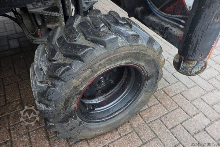 Scissor lift Holland Lift Combistar B-195DL25-4WD/P/N Diesel, 4x4 Drive, 21.